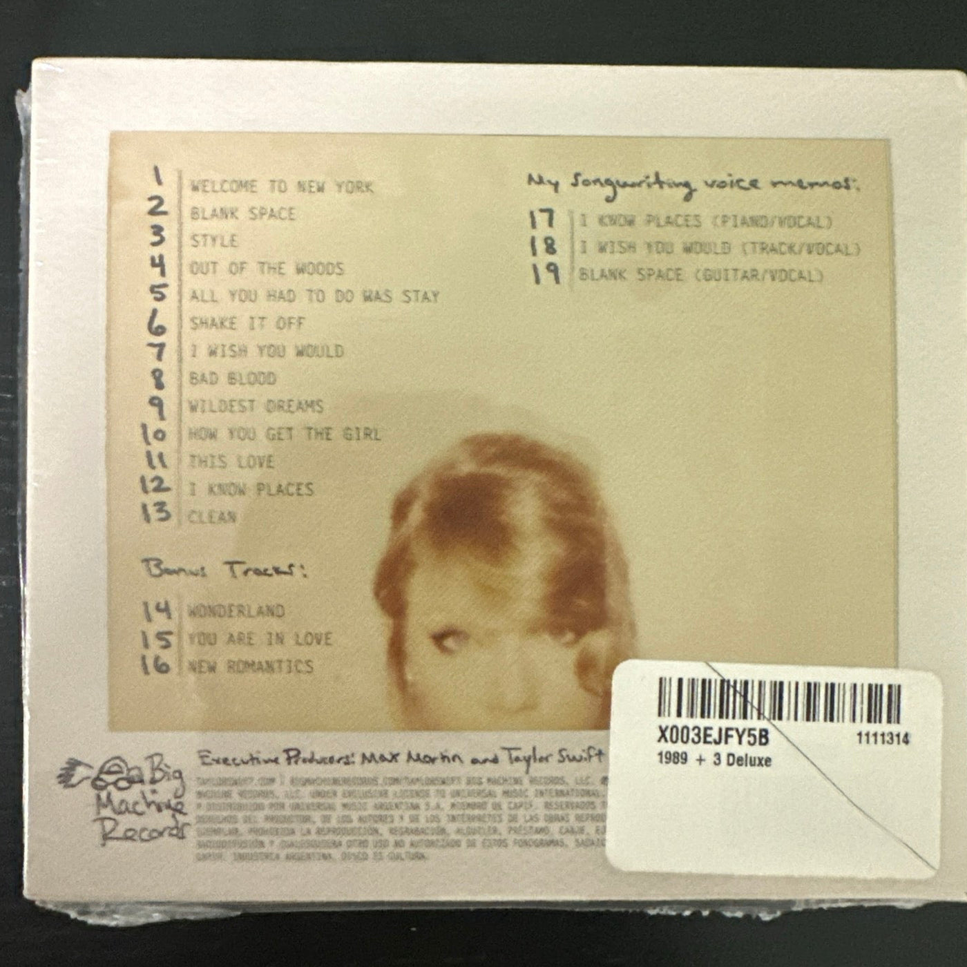 Sealed Taylor Swift 1989 D.L.X. exclusive CD, showing the album cover with vibrant artwork and standard jewel case packaging.