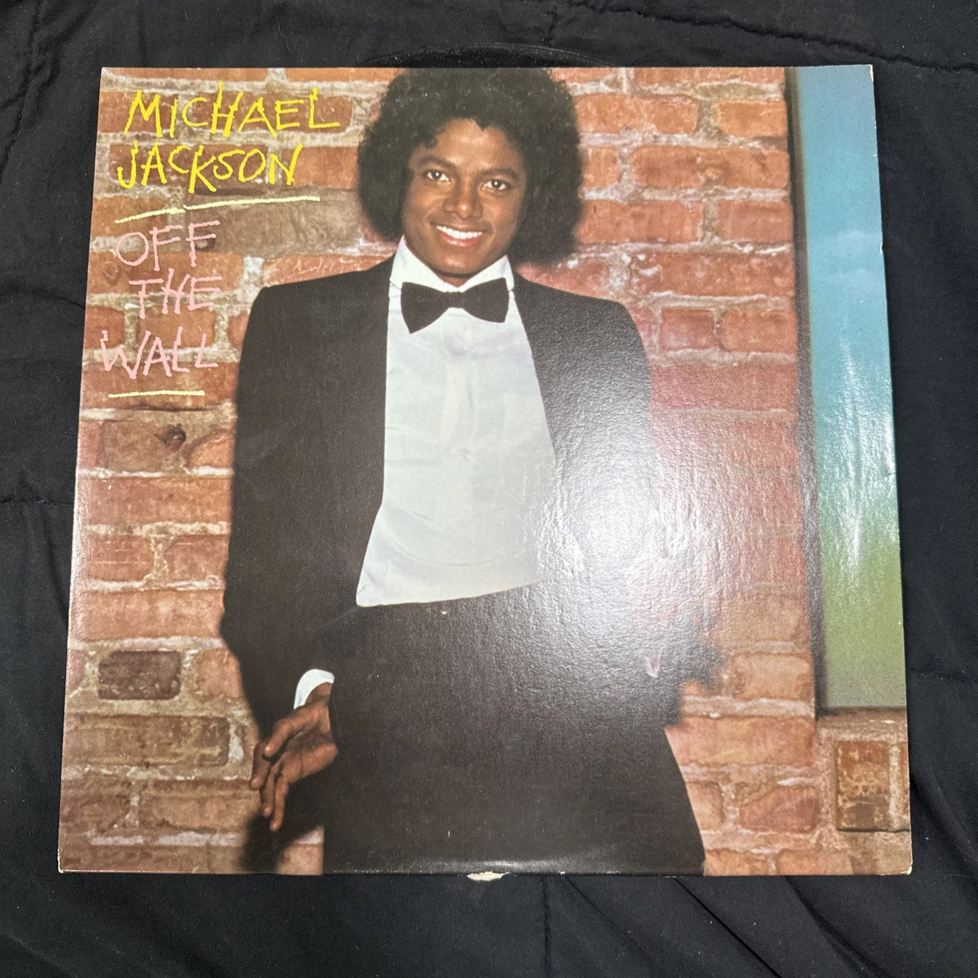 Michael Jackson Off the Wall 1979 vinyl record LP with colorful album cover artwork and vintage-style design.