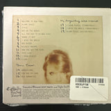 Sealed Taylor Swift 1989 D.L.X. exclusive CD, showing the album cover with vibrant artwork and standard jewel case packaging.