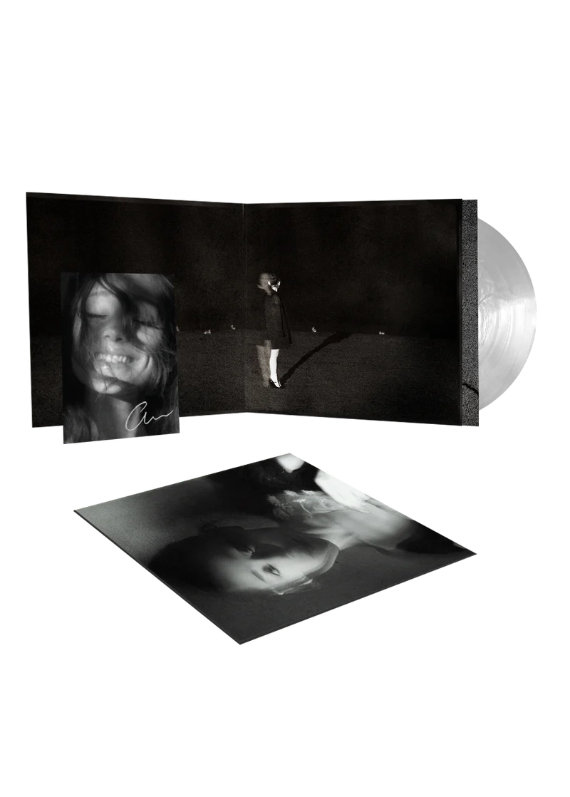 Ariana Grande Petal translucent white vinyl LP with signed art card, featuring floral design and album artwork.