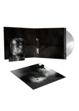 Ariana Grande Petal translucent white vinyl LP with signed art card, featuring floral design and album artwork.