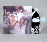 Bassvictim Basspunk 1 & 2 vinyl record with colorful TTL 6-spoke design, showcasing vibrant colored vinyl and album artwork.