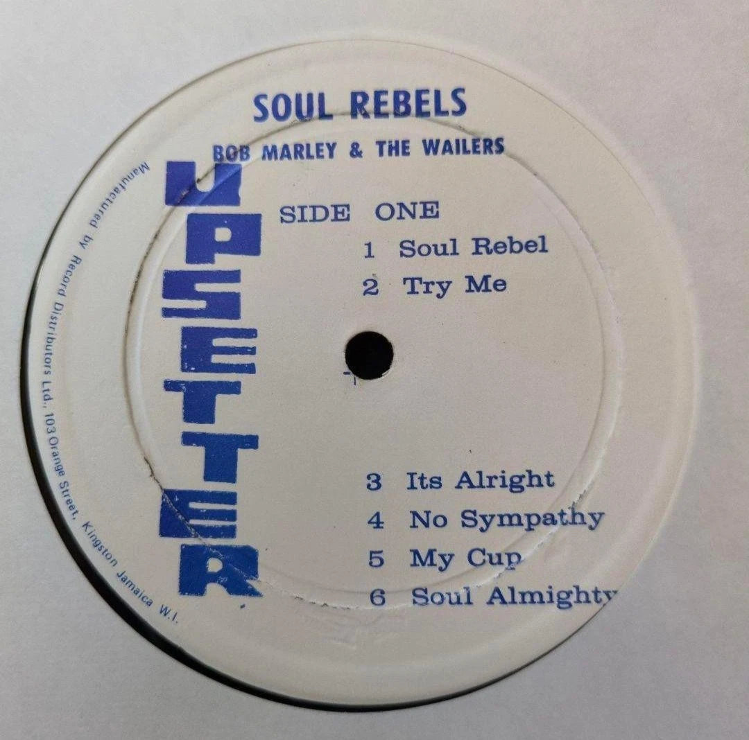 Bob Marley & The Wailers Soul Rebels vinyl LP record with colorful album cover artwork, Jamaican Upsetter Press VG quality