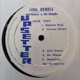Bob Marley & The Wailers Soul Rebels vinyl LP pressed by Jamaican Upsetter, showing the album cover and vinyl inside.