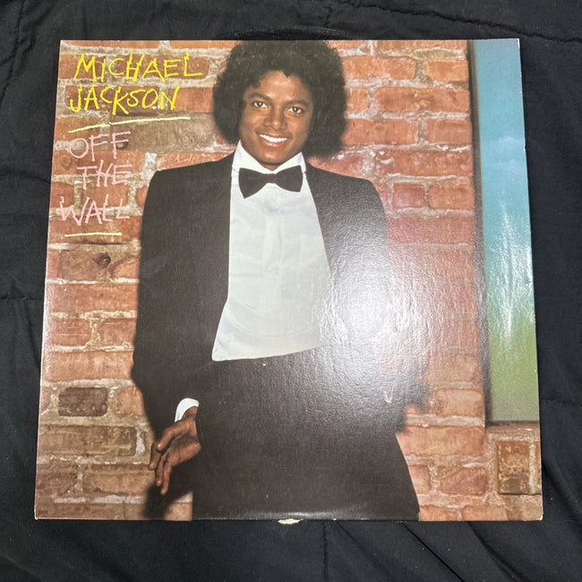 Michael Jackson Off the Wall 1979 vinyl record LP with colorful album cover artwork and vintage-style design.