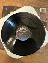 Michael Jackson Off the Wall 1979 vinyl LP record with colorful album cover art.