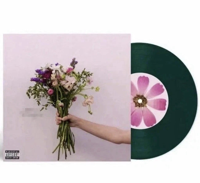 Olivia Rodrigo Walk in the Park midnight exclusive 7-inch green vinyl record with album cover artwork and record label details.
